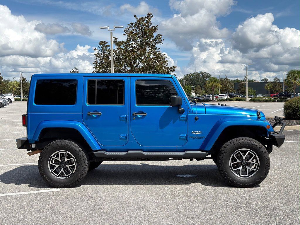 Used 2015 Jeep Wrangler Unlimited Sahara w/ Dual Top Group AWD/4WD image 6