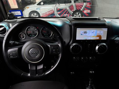 Used 2013 Jeep Wrangler Unlimited Sahara AWD/4WD image 17