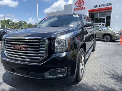 Used 2016 GMC Yukon XL SLT w/ Premium Edition AWD/4WD image 1