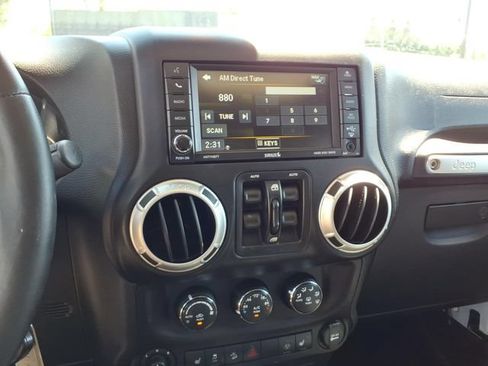 Used 2015 Jeep Wrangler Unlimited Sahara w/ Dual Top Group AWD/4WD image 13