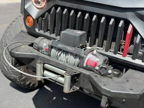 Used 2013 Jeep Wrangler Unlimited Sahara w/ Mopar Chrome Edition Group AWD/4WD image 36