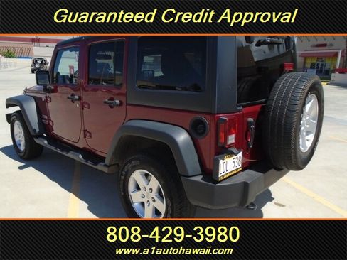 Used 2013 Jeep Wrangler Unlimited Sport AWD/4WD image 2