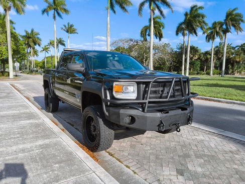 Used 2014 GMC Sierra 1500 SLT w/ SLT Preferred Package AWD/4WD image 1