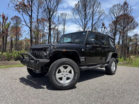 Used 2012 Jeep Wrangler Unlimited Sport w/ Connectivity Group AWD/4WD image 1