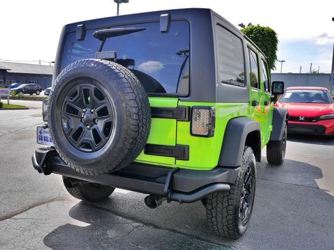 Used 2013 Jeep Wrangler Unlimited Sahara AWD/4WD image 6