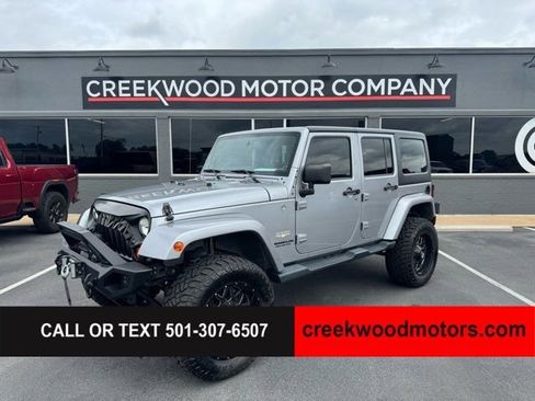 Used 2013 Jeep Wrangler Unlimited Sahara w/ Connectivity Group image 1