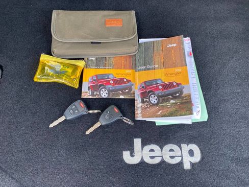 Used 2012 Jeep Wrangler Unlimited Sahara w/ Dual Top Group AWD/4WD image 36