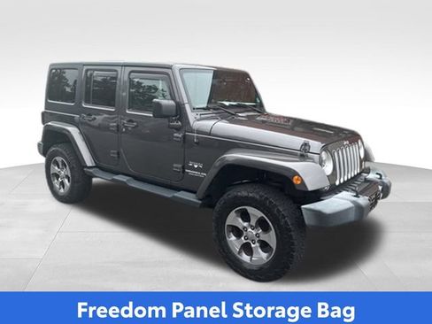 Used 2016 Jeep Wrangler Unlimited Sahara w/ Dual Top Group AWD/4WD image 33