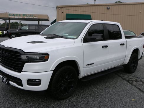 Used 2025 RAM 1500 Laramie w/ Night Edition AWD/4WD image 1