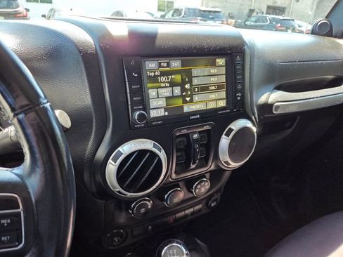 Used 2014 Jeep Wrangler Unlimited Sahara w/ Dual Top Group AWD/4WD image 12
