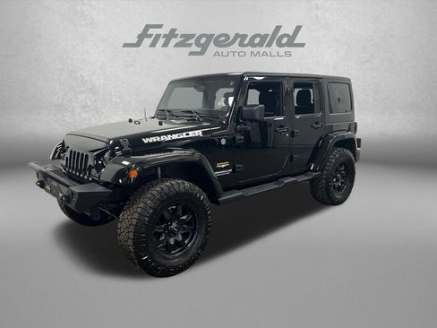 Used 2013 Jeep Wrangler Unlimited Sahara w/ Connectivity Group AWD/4WD image 1