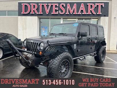 Used 2011 Jeep Wrangler Unlimited Rubicon w/ Dual Top Group