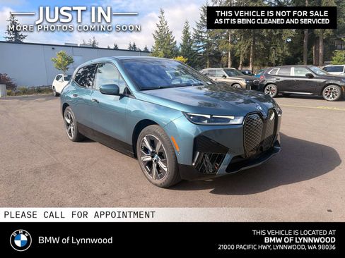 Used 2024 BMW iX xDrive50 w/ Sport Package AWD/4WD image 1