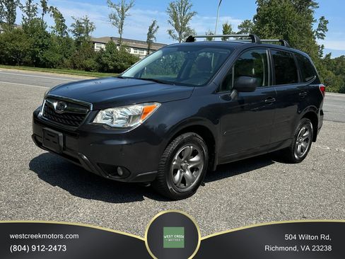 Used 2014 Subaru Forester 2.5i AWD/4WD image 1