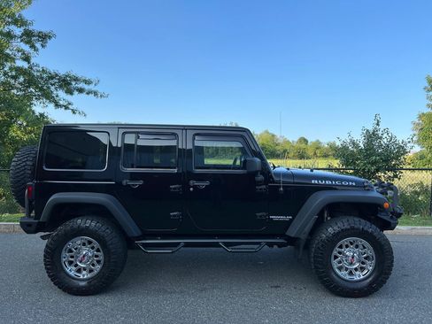 Used 2014 Jeep Wrangler Unlimited Rubicon w/ Dual Top Group AWD/4WD image 3