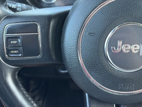 Used 2014 Jeep Wrangler Unlimited Sahara w/ Dual Top Group AWD/4WD image 14
