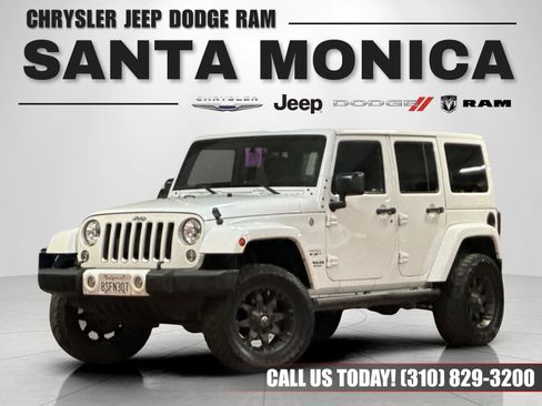 Used 2016 Jeep Wrangler Unlimited Sahara w/ Max Tow Package AWD/4WD image 1