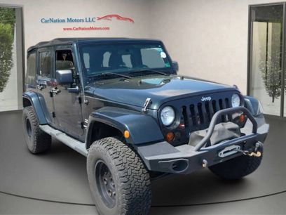 Used 2012 Jeep Wrangler Unlimited Sahara w/ Dual Top Group