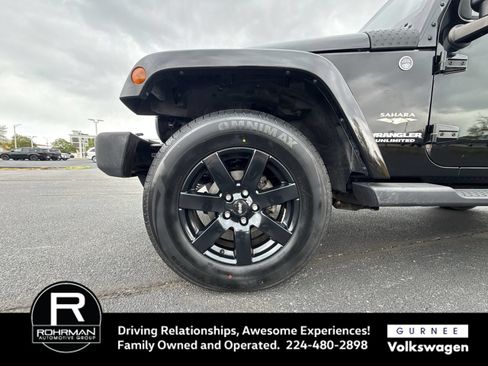 Used 2011 Jeep Wrangler Unlimited Sahara w/ Dual Top Group AWD/4WD image 11