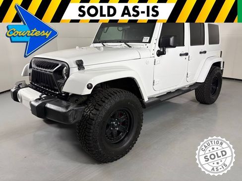 Used 2012 Jeep Wrangler Unlimited Sahara AWD/4WD image 4