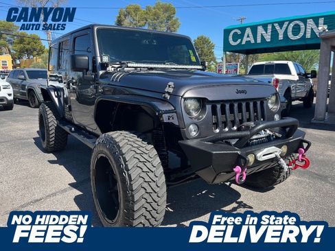 Used 2014 Jeep Wrangler Unlimited Sahara w/ Connectivity Group AWD/4WD image 1