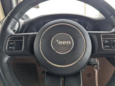 Used 2012 Jeep Wrangler Unlimited Sahara AWD/4WD image 14