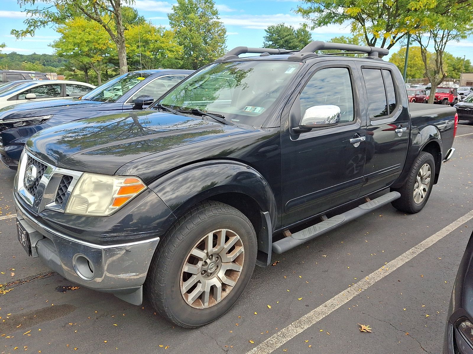 Used 2011 Nissan Frontier SL AWD/4WD image 2