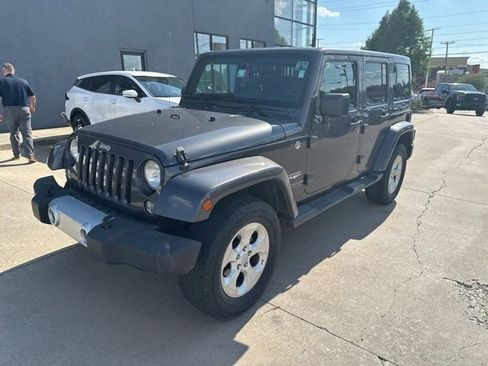 Used 2014 Jeep Wrangler Unlimited Sahara w/ Connectivity Group AWD/4WD image 1