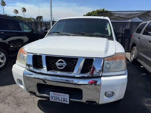 Used 2012 Nissan Titan SV w/ SV Premium Utility Pkg RWD image 2