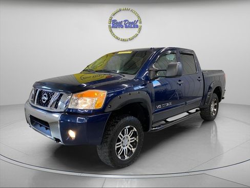 Used 2012 Nissan Titan SV w/ SV Premium Utility Pkg AWD/4WD image 1