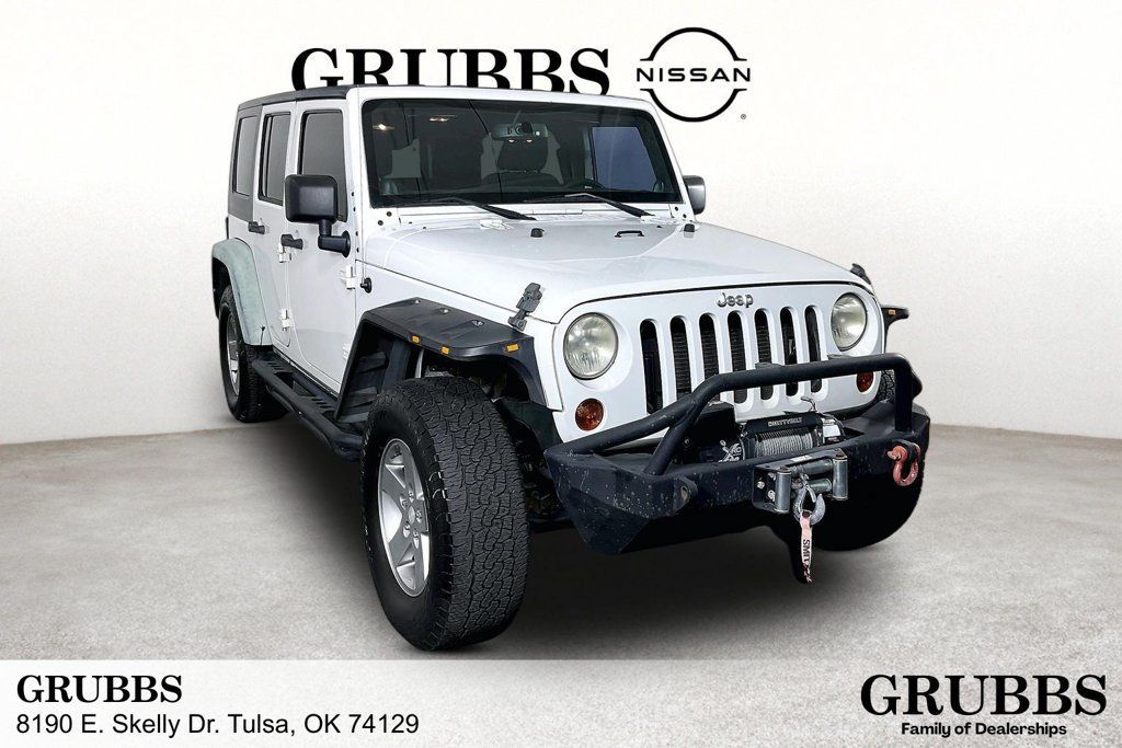 Used 2013 Jeep Wrangler Unlimited Sport AWD/4WD image 1