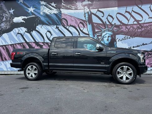 Used 2015 Ford F150 Platinum w/ FX4 Off-Road Package AWD/4WD image 1