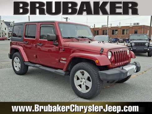 Used 2012 Jeep Wrangler Unlimited Sahara w/ Dual Top Group image 1
