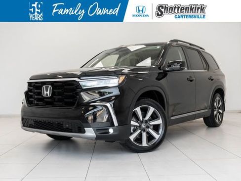 Used 2024 Honda Pilot Touring image 1