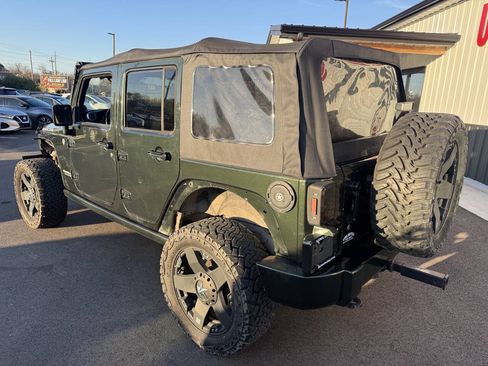Used 2011 Jeep Wrangler Unlimited Rubicon w/ Dual Top Group AWD/4WD image 11