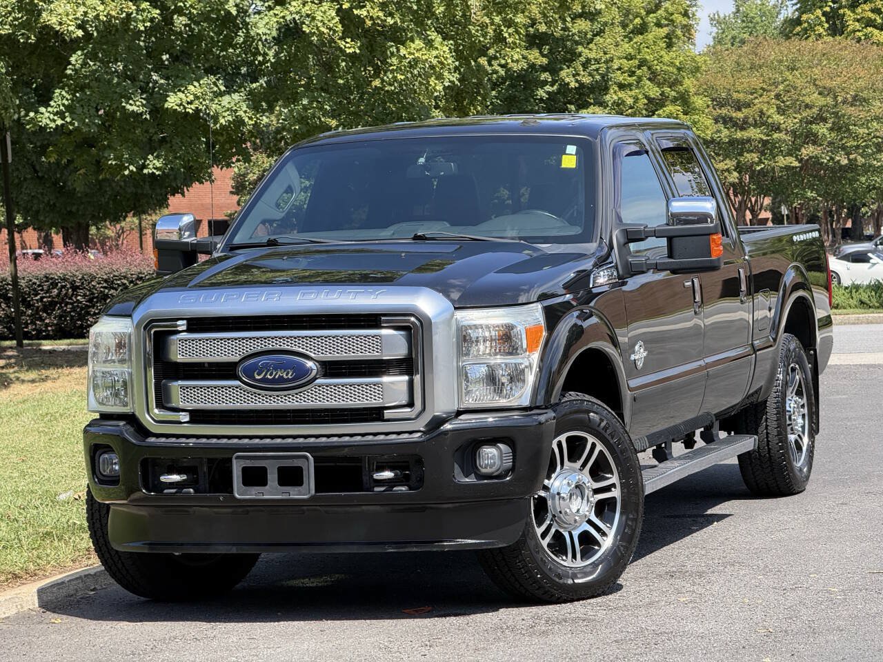 Used 2014 Ford F250 Platinum w/ FX4 Off-Road Package AWD/4WD image 1