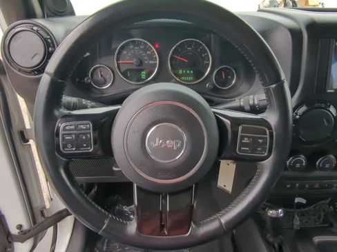 Used 2014 Jeep Wrangler Unlimited Sahara w/ Dual Top Group AWD/4WD image 21