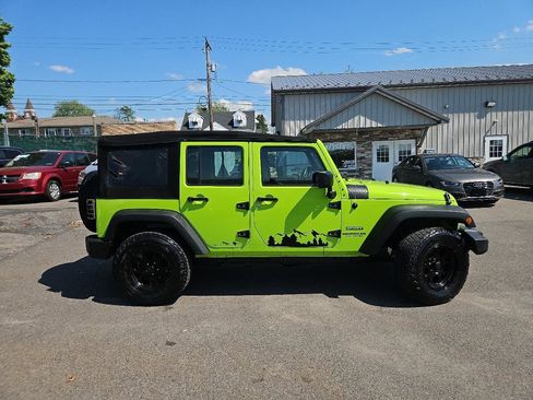 Used 2012 Jeep Wrangler Unlimited Sport AWD/4WD image 2