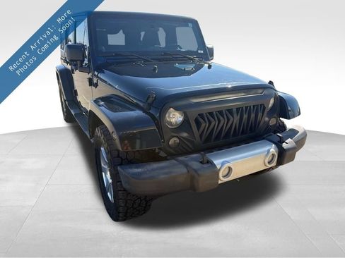 Used 2012 Jeep Wrangler Unlimited Sahara w/ Max Tow Pkg image 1