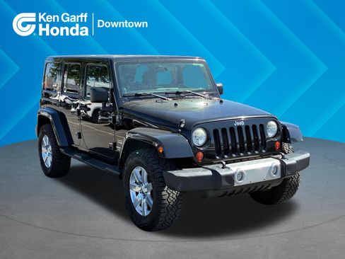 Used 2012 Jeep Wrangler Unlimited Sahara w/ Connectivity Group AWD/4WD image 1