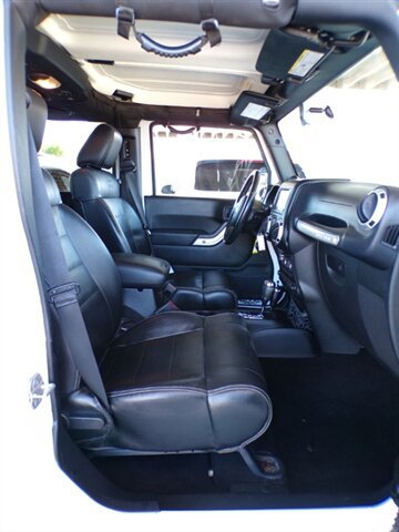 Used 2012 Jeep Wrangler Unlimited Sahara w/ Dual Top Group AWD/4WD image 25