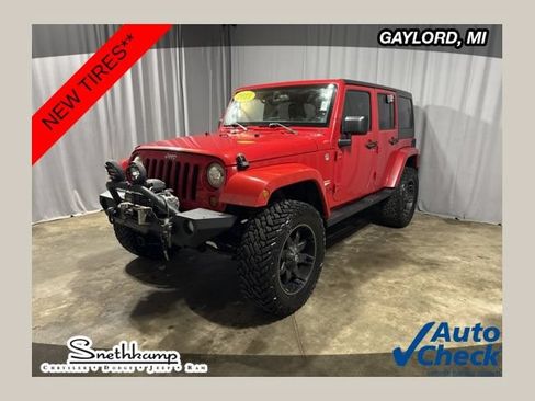 Used 2013 Jeep Wrangler Unlimited Sahara AWD/4WD image 1