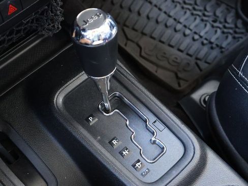 Used 2015 Jeep Wrangler Unlimited Sahara w/ Dual Top Group AWD/4WD image 16