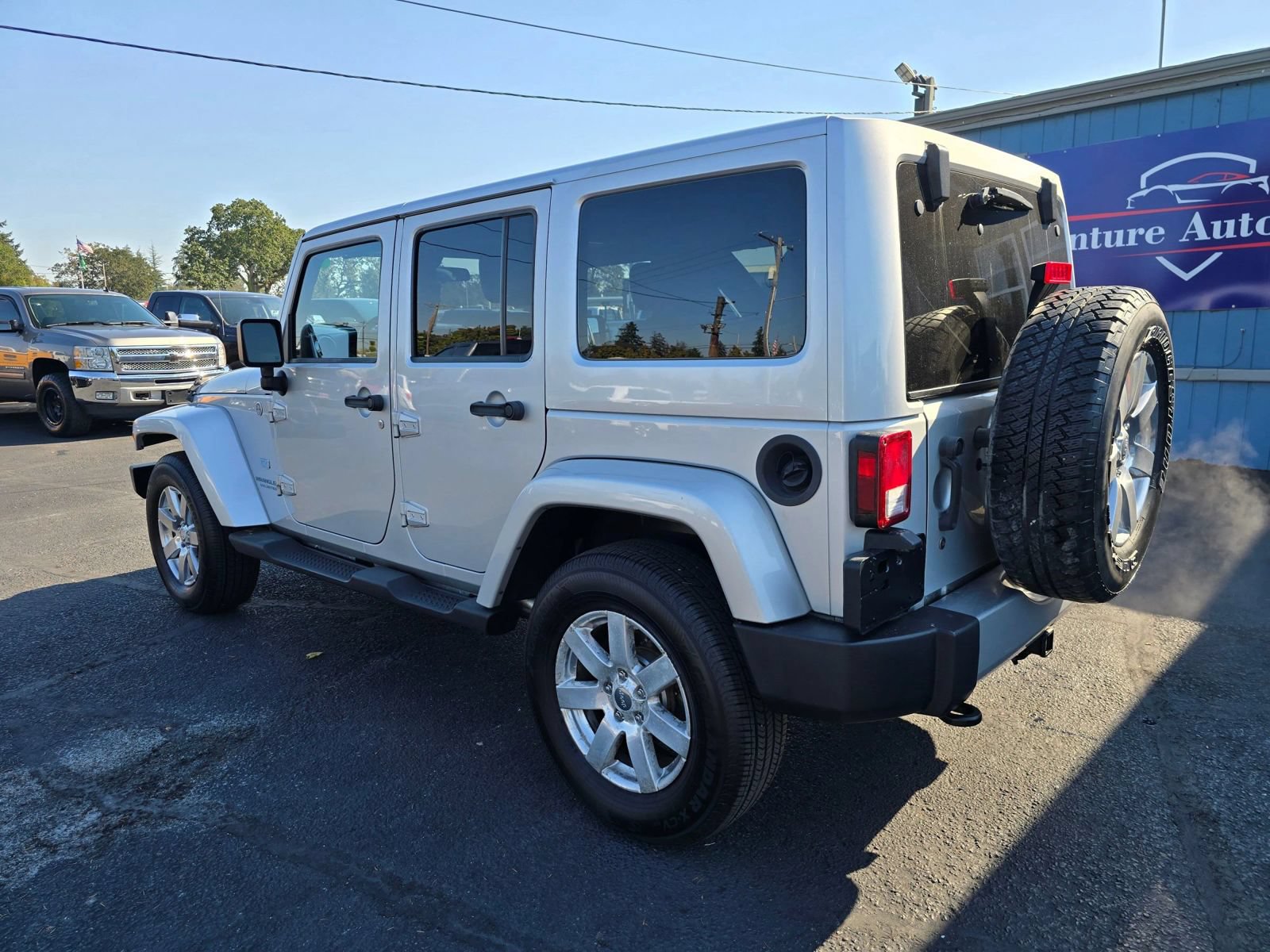 Used 2011 Jeep Wrangler Unlimited 70th Anniversary w/ Dual Top Group AWD/4WD image 3