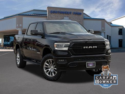 Used 2024 RAM 1500 Laramie AWD/4WD image 1
