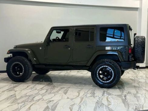 Used 2015 Jeep Wrangler Unlimited Sahara w/ Max Tow Package AWD/4WD image 8