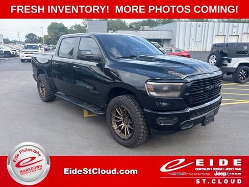 Used 2024 RAM 1500 Laramie AWD/4WD image 1