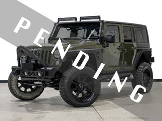 Used 2015 Jeep Wrangler Unlimited Sahara w/ Connectivity Group AWD/4WD video 1