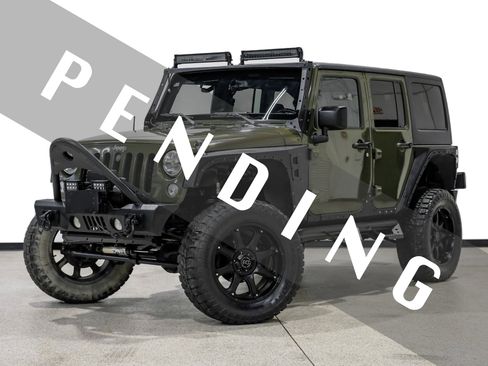 Used 2015 Jeep Wrangler Unlimited Sahara w/ Connectivity Group AWD/4WD image 1