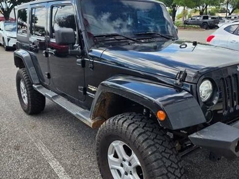 Used 2014 Jeep Wrangler Unlimited Sahara AWD/4WD image 9
